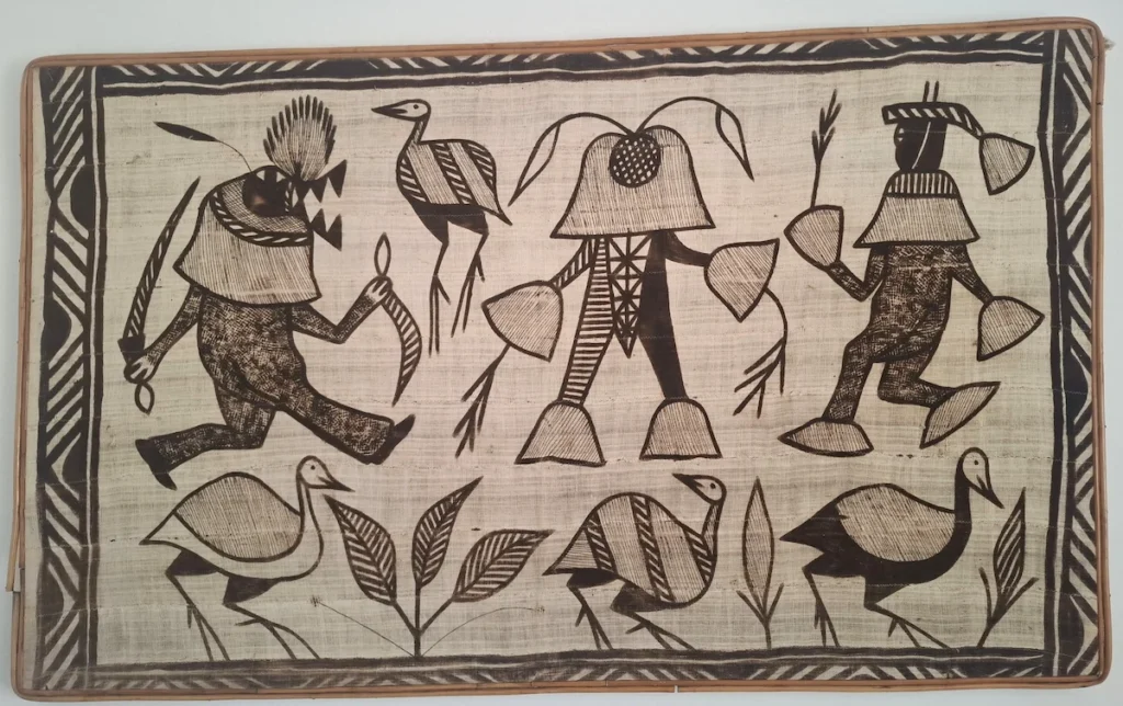 Toile de Fakaha de Korhogo représentant des motifs traditionnels sénoufos en noir et blanc.